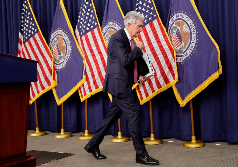 FILE PHOTO: U.S. Federal Reserve Chair Jerome Powell leaves after addressing reporters, after the Fed raised its target interest rate by a quarter of a percentage point, during a news conference at the Federal Reserve Building in Washington, U.S., February 1, 2023. REUTERS/Jonathan Ernst/File photo