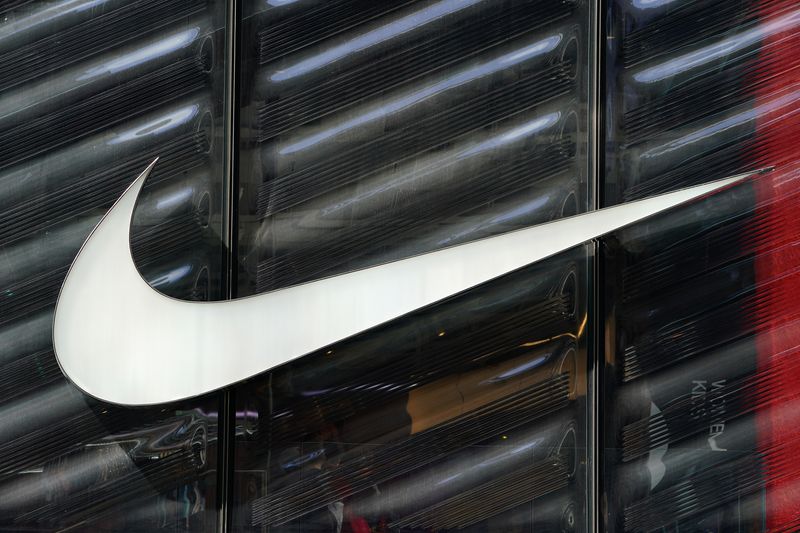 FILE PHOTO: The Nike swoosh logo is seen outside the store on 5th Ave in New York, New York, U.S., March 19, 2019.   REUTERS/Carlo Allegri/File photo