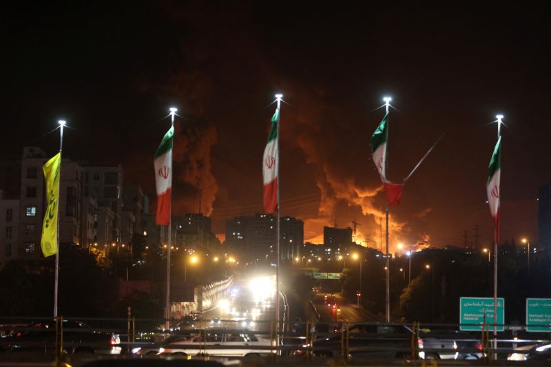 Fire of Israeli attack on Sharan Oil depot is seen following the Israeli strikes on Iran, in Tehran, Iran, June 15, 2025. Majid Asgaripour/WANA (West Asia News Agency) via REUTERS   ATTENTION EDITORS - THIS PICTURE WAS PROVIDED BY A THIRD PARTY