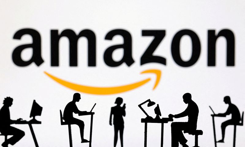 FILE PHOTO: Figurines with computers and smartphones are seen in front of Amazon logo in this illustration taken, February 19, 2024. REUTERS/Dado Ruvic/Illustration/File Photo