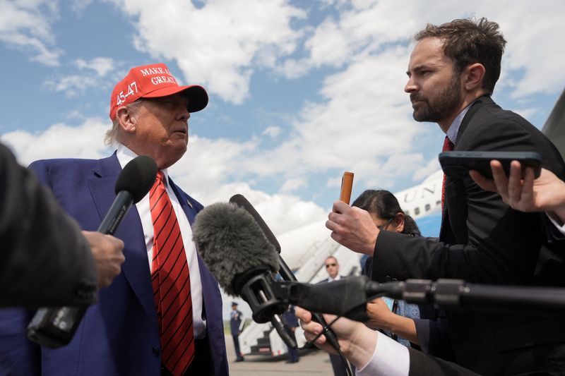 U.S. President Donald Trump talks to reporters upon his arrival at Morristown Municipal Airport in Morristown, New Jersey, U.S., June 20, 2025. REUTERS/Ken Cedeno