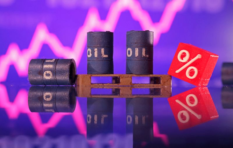 FILE PHOTO: Miniatures of oil barrels and a rising stock graph are seen in this illustration taken January 15, 2024. REUTERS/Dado Ruvic/Illustration/File Photo