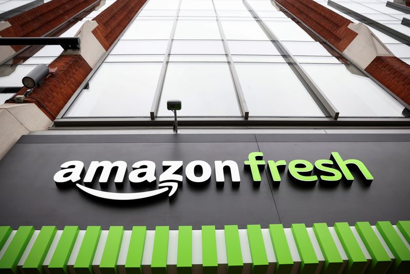 FILE PHOTO: The sign at the entrance of the UK's first Amazon Fresh supermarket is seen in London, Britain March 4, 2021. REUTERS/Henry Nicholls/File photo