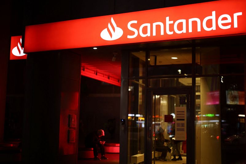 FILE PHOTO: A logo of Santander Bank Polska is seen on its branch in the centre of Warsaw, Poland, March 5, 2025. REUTERS/Kacper Pempel/ File Photo