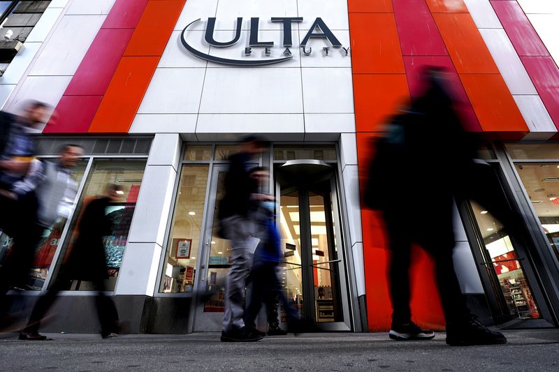 FILE PHOTO: People walk past an Ulta Beauty store in the Manhattan borough of New York City, New York, U.S., March 8, 2022.  REUTERS/Carlo Allegri/ File Photo