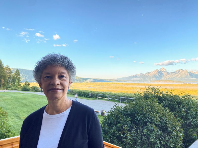 FILE PHOTO: Federal Reserve Bank of Boston President Susan Collins stands behind the Jackson Lake Lodge in Jackson Hole, where the Kansas City Fed holds its annual economic symposium, in Wyoming, U.S., August 24, 2023. REUTERS/Ann Saphir/File Photo