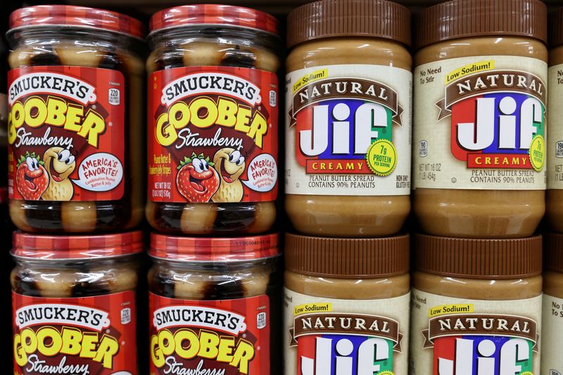 FILE PHOTO: Smucker's Goober Strawberry and Jif peanut butter, brands owned by The J.M. Smucker Company, are seen for sale in a store in Manhattan, New York City, U.S., November 22, 2021. REUTERS/Andrew Kelly/File Photo