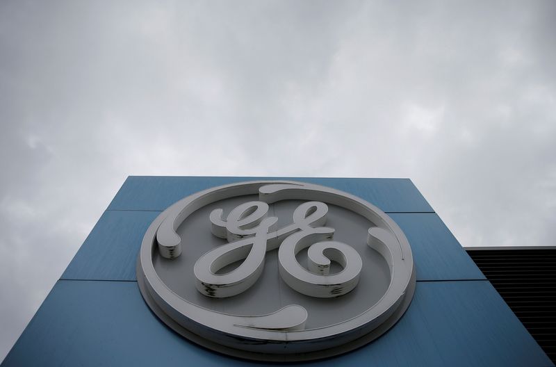 FILE PHOTO: The logo of U.S. conglomerate General Electric is seen on the company building in Belfort, France, October 19, 2019. REUTERS/Vincent Kessler/File Photo