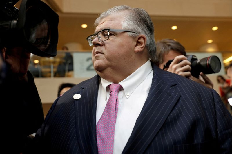 FILE PHOTO: Bank for International Settlements (BIS) General Manager Agustin Carstens leaves after G-20 finance ministers and central banks governors family photo during the IMF/World Bank spring meeting in Washington, U.S., April 20, 2018. REUTERS/Yuri Gripas/File Photo