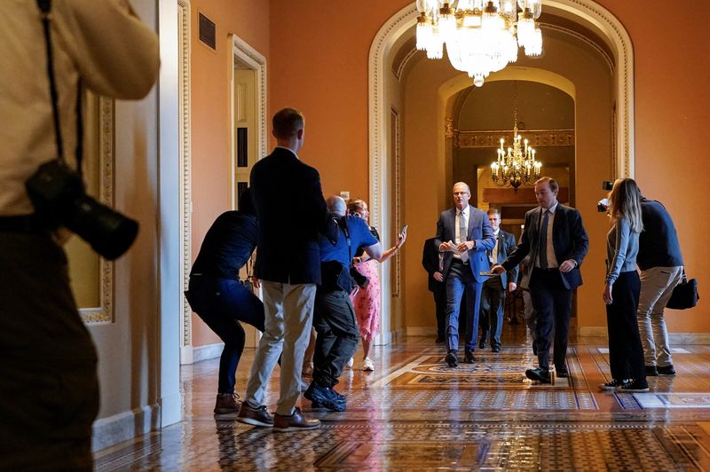 U.S. Senate Majority Leader John Thune (R-SD) walks in Capitol Hill, as Republican lawmakers struggle to pass U.S. President Donald Trump’s sweeping spending and tax bill, in Washington, D.C., U.S., June 30, 2025.  REUTERS/Elizabeth Frantz