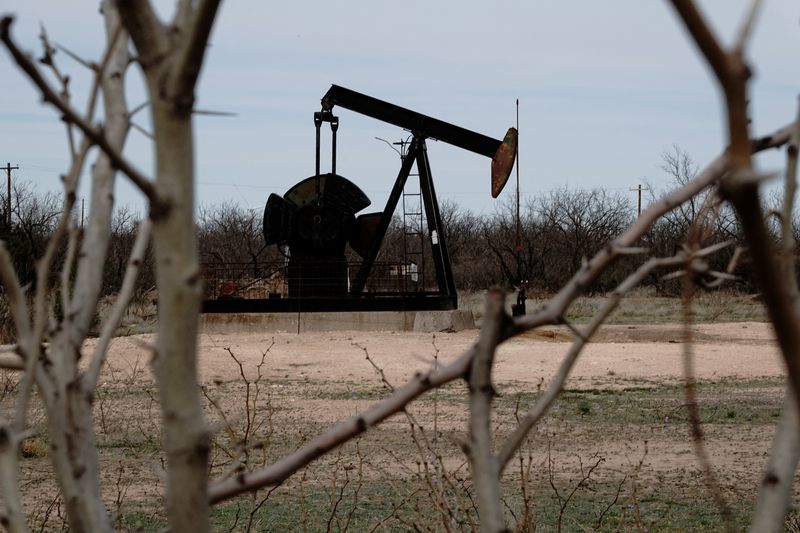 FILE PHOTO: A pump jack drills oil crude from the Yates Oilfield in West Texas’s Permian Basin, near Iraan, Texas, U.S., March 17, 2023. REUTERS/Bing Guan/File Photo