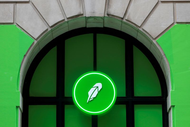 FILE PHOTO: The logo of Robinhood Markets, Inc. is seen at a pop-up event on Wall Street after the company's IPO in New York City, U.S., July 29, 2021.  REUTERS/Andrew Kelly/File Photo