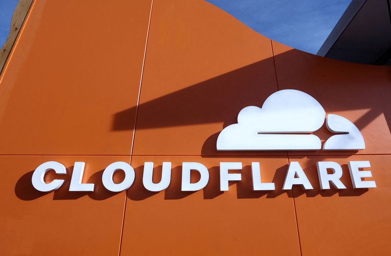 FILE PHOTO: A logo of CLOUDFLARE sits outside the company's house on the opening day of the 55th annual meeting of the World Economic Forum (WEF) in Davos, Switzerland, January 20, 2025. REUTERS/Yves Herman/File Photo