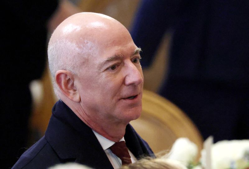 FILE PHOTO: Amazon founder Jeff Bezos in the Statuary Hall of the U.S. Capitol before the luncheon on the inauguration day of U.S. President Donald Trump's second Presidential term in Washington, U.S., January 20, 2025. REUTERS/Evelyn Hockstein/ File Photo