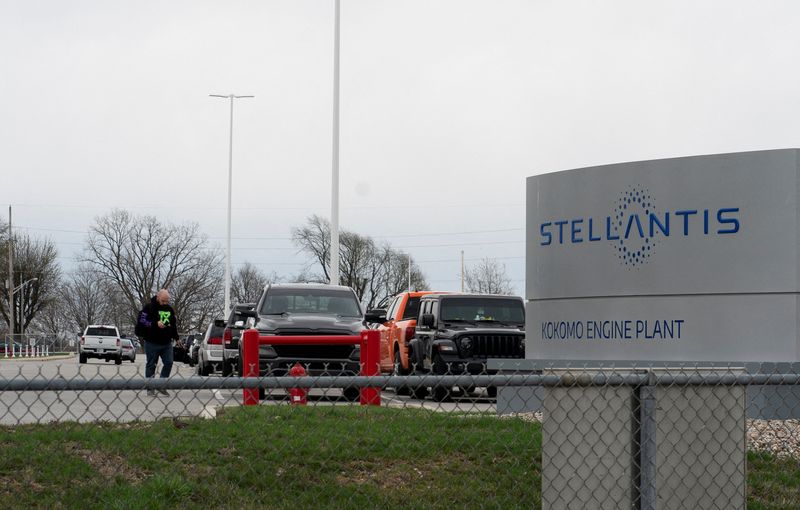 FILE PHOTO: Stellantis Kokomo engine plant employee walks out of the Stellantis plant in Kokomo, Indiana, U.S.,  April 3, 2025.  REUTERS/Stephanie Amador/File Photo