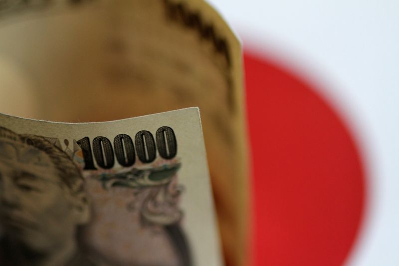 FILE PHOTO: A Japan Yen note is seen in this illustration photo taken June 1, 2017. REUTERS/Thomas White/Illustration/ File Photo