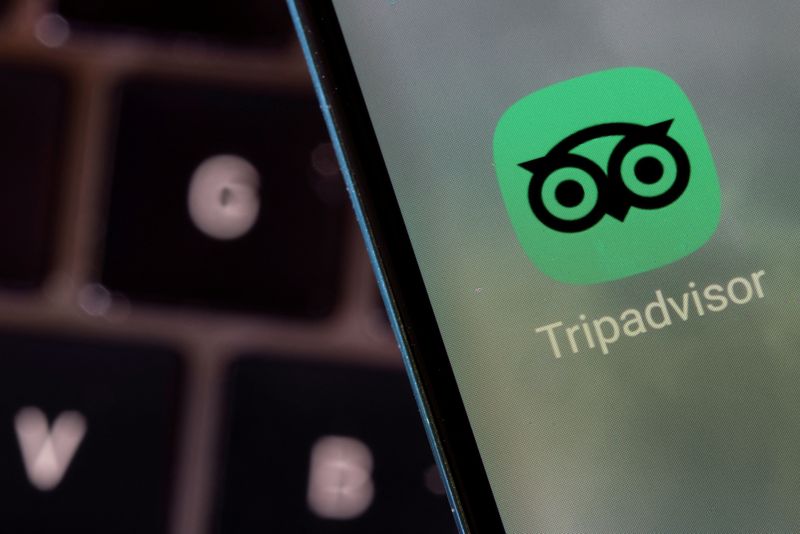 FILE PHOTO: Tripadvisor app is seen on a smartphone in this illustration taken February 27, 2022. REUTERS/Dado Ruvic/Illustration/File Photo