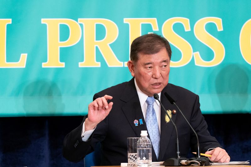 FILE PHOTO: Japan's Prime Minister and Liberal Democratic Party President Shigeru Ishiba speaks during a debate with leaders of other political parties at the Japan National Press Club in Tokyo, Japan, July 2, 2025.     Tomohiro Ohsumi/Pool via REUTERS/File Photo