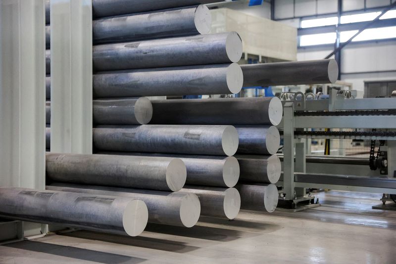 FILE PHOTO: Large aluminum billets are stored at Magna Aluminum Profile in Salaberry de Valleyfield, Quebec, Canada, June 11, 2025. REUTERS/Evan Buhler/File Photo