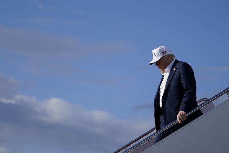 U.S. President Donald Trump disembarks Air Force One as he arrives at Joint Base Andrews, Maryland, U.S, July 6, 2025. REUTERS/Nathan Howard/File Photo