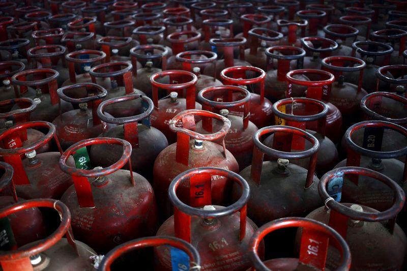 Empty Liquefied Petroleum Gas (LPG) cylinders are seen at a gas distribution centre in Dujana village, India, October 7, 2015.   REUTERS/Anindito Mukherjee/File Photo