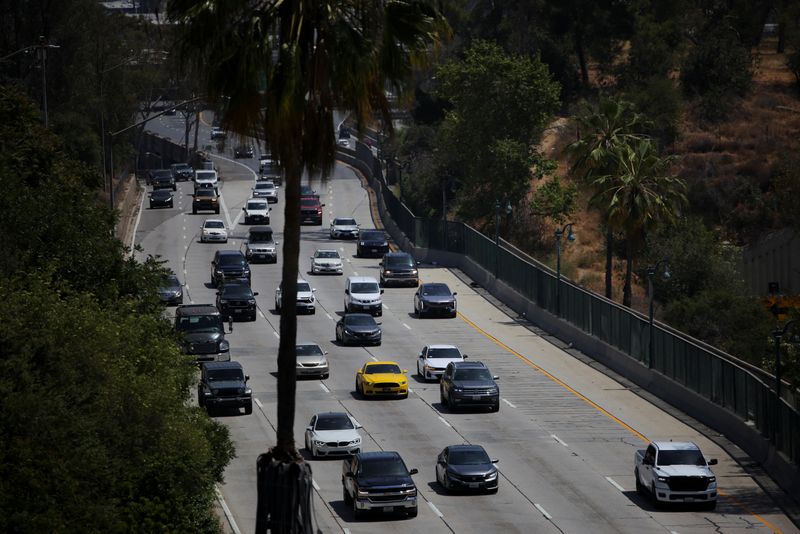 FILE PHOTO: Cars drive along the 110 Freeway in Los Angeles, California, U.S., May 22, 2025. REUTERS/Daniel Cole/ File Photo