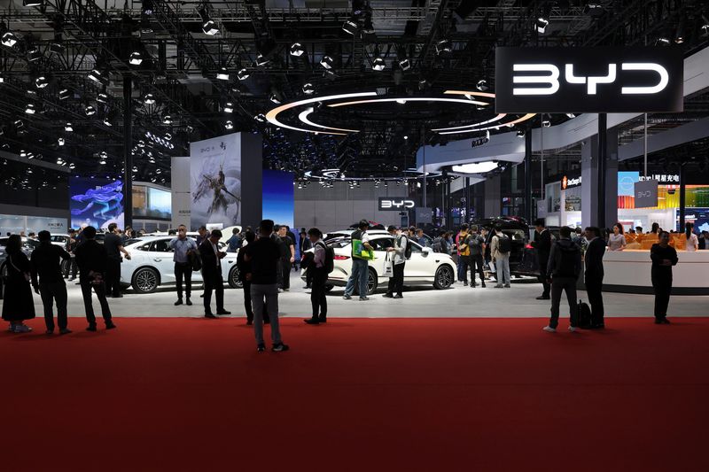People visit the BYD booth during a media day for the Auto Shanghai show in Shanghai, China April 23, 2025. REUTERS/Go Nakamura/File Photo