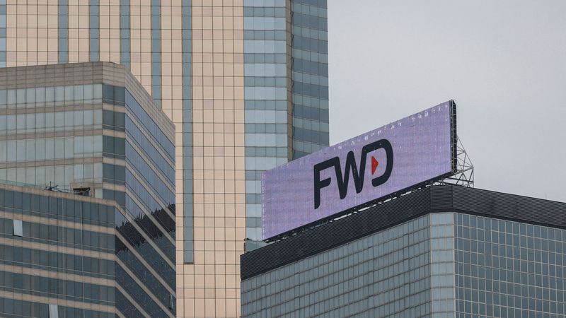 FILE PHOTO: The logo of FWD group is seen on a building in Hong Kong, China March 20, 2023. REUTERS/Tyrone Siu/File Photo