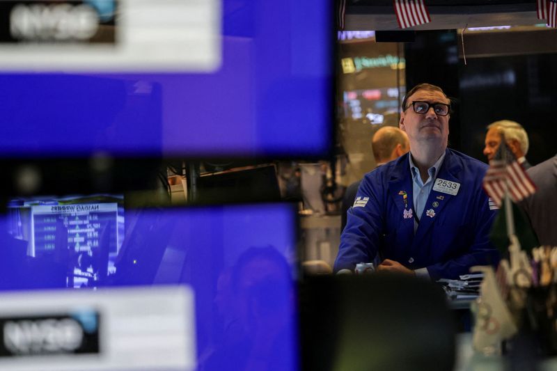 A trader works on the floor at the New York Stock Exchange (NYSE) in New York City, U.S., July 8, 2025. REUTERS/Jeenah Moon