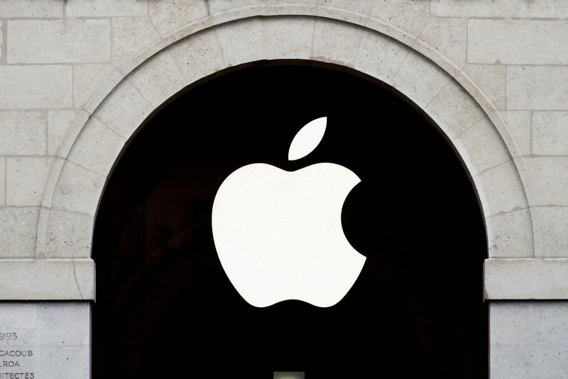 FILE PHOTO: Apple logo is seen on the Apple store at The Marche Saint Germain in Paris, France July 15, 2020.  REUTERS/Gonzalo Fuentes/File Photo