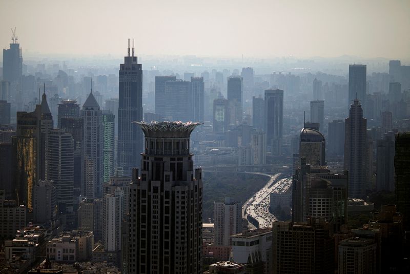 FILE PHOTO: A view of the city skyline in Shanghai, China February 24, 2022. Picture taken February 24, 2022. REUTERS/Aly Song//File Photo