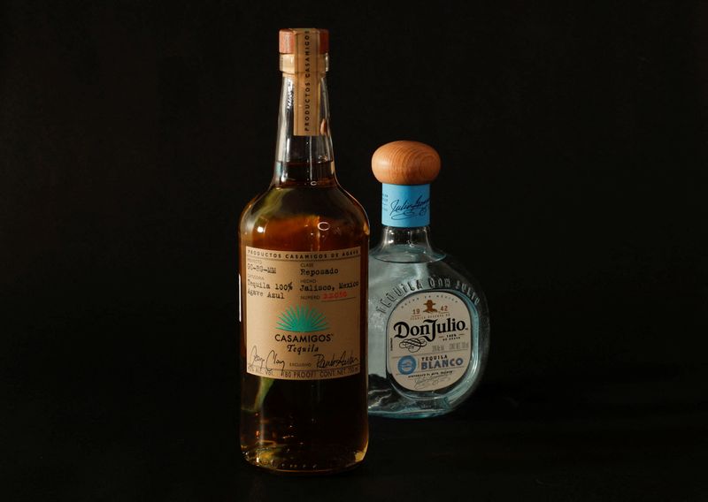 FILE PHOTO: Bottles of Diageo's Casamigos and Don Julio tequila are displayed in this illustration taken, December 10, 2024. REUTERS/Henry Romero/Illustration/ File Photo