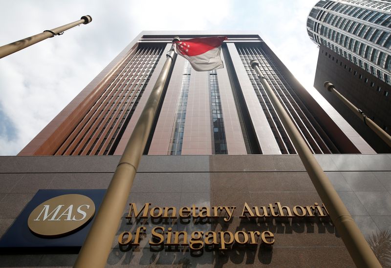 FILE PHOTO: A view of the Monetary Authority of Singapore's headquarters in Singapore June 28, 2017. Picture taken June 28, 2017. REUTERS/Darren Whiteside/File Photo