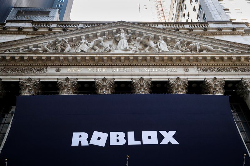 FILE PHOTO: The Roblox logo is displayed on a banner, to celebrate the company's IPO, on the front facade of the New York Stock Exchange (NYSE) in New York, U.S., March 10, 2021. REUTERS/Brendan McDermid/File Photo