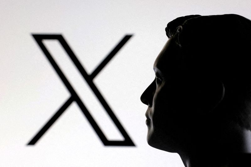 FILE PHOTO: A 3D-printed miniature model of Elon Musk and the X logo are seen in this illustration taken January 23, 2025. REUTERS/Dado Ruvic/Illustration/File Photo/File Photo