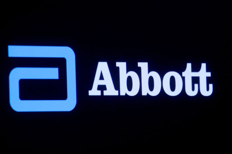 FILE PHOTO: Abbott Laboratories logo is displayed on a screen at the New York Stock Exchange (NYSE) in New York City, U.S., October 18, 2021. REUTERS/Brendan McDermid/File Photo