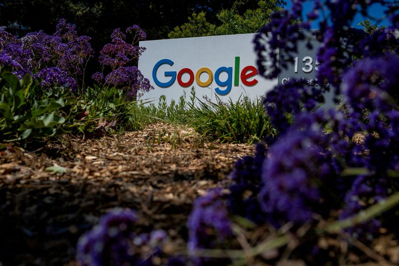 FILE PHOTO: Google logo is seen at a company research facility in Mountain View, California, U.S., May 13, 2025. REUTERS/Carlos Barria/File Photo