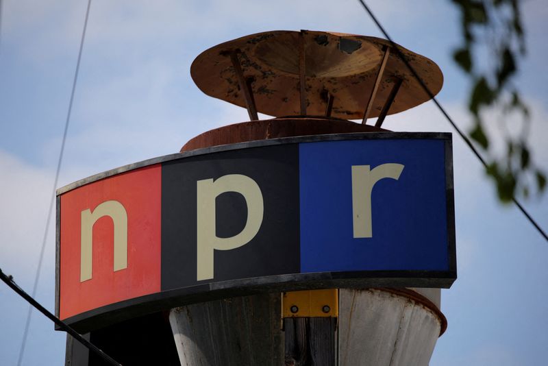 FILE PHOTO: The logo of the National Public Radio is pictured on the day National Public Radio and three Colorado public radio stations sued the Trump administration over the president's executive order to cut federal funding for public broadcasting, at its West office in Culver City, California, U.S., May 27, 2025. REUTERS/Daniel Cole/File Photo
