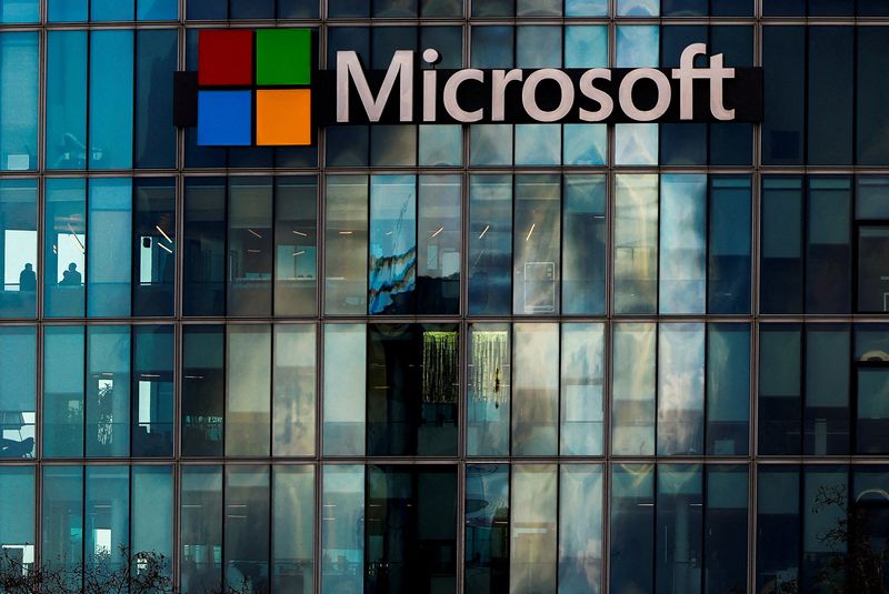 FILE PHOTO: A view shows a Microsoft logo at Microsoft offices in Issy-les-Moulineaux near Paris, France, January 9, 2025. REUTERS/Gonzalo Fuentes/File Photo