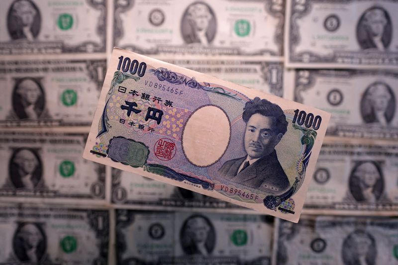 FILE PHOTO: Yen and U.S. dollar banknotes are seen in this illustration taken March 19, 2025. REUTERS/Dado Ruvic/Illustration/ File Photo