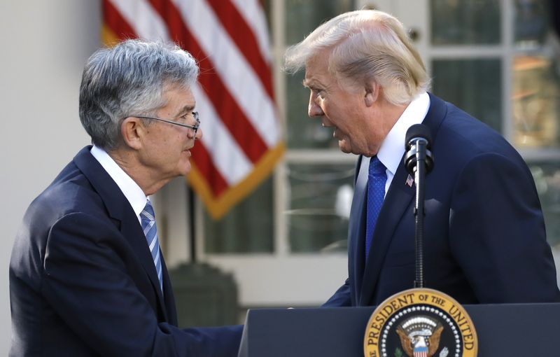 U.S. President Donald Trump arrives shakes hands with Jerome Powell, his nominee to become chairman of the U.S. Federal Reserve at the White House in Washington, U.S., November 2, 2017. REUTERS/Carlos Barria/File Photo