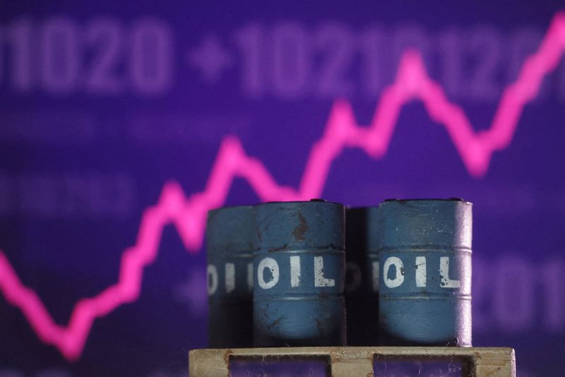 FILE PHOTO: Rising stock graph and 3D printed oil barrels miniature are seen in this illustration taken June 23, 2025. REUTERS/Dado Ruvic/Illustration/File Photo
