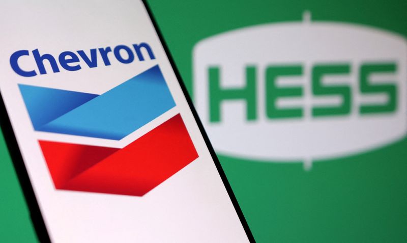 FILE PHOTO: Chevron and Hess logos are seen in this illustration taken, October 23, 2023. REUTERS/Dado Ruvic/Illustration/File Photo