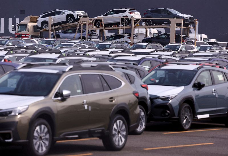 FILE PHOTO: Newly manufactured cars awaiting export are parked at a port in Yokohama, south of Tokyo, Japan March 27, 2025.  REUTERS/Issei Kato/File Photo/File Photo