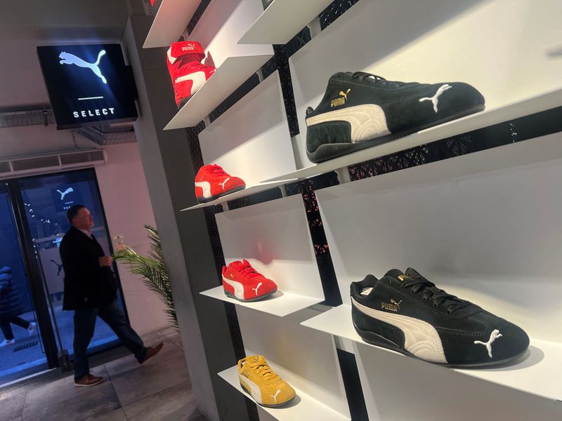 FILE PHOTO: Puma Speedcat trainers are displayed at a Puma store London, Britain, January 23, 2025. REUTERS/Hannah McKay/File Photo