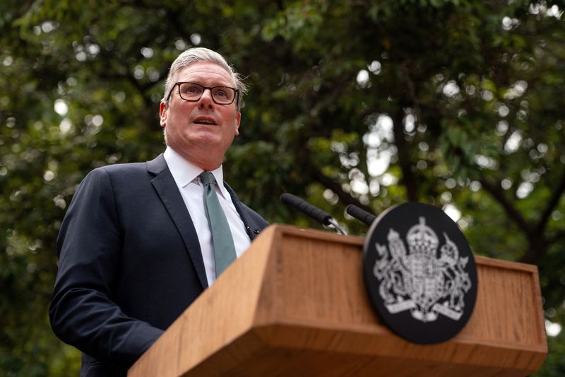 FILE PHOTO: British Prime Minister, Keir Starmer, speaks during a reception for public sector workers at 10 Downing Street, in London, England July 1, 2025.  Carl Court/Pool via REUTERS/ File Photo