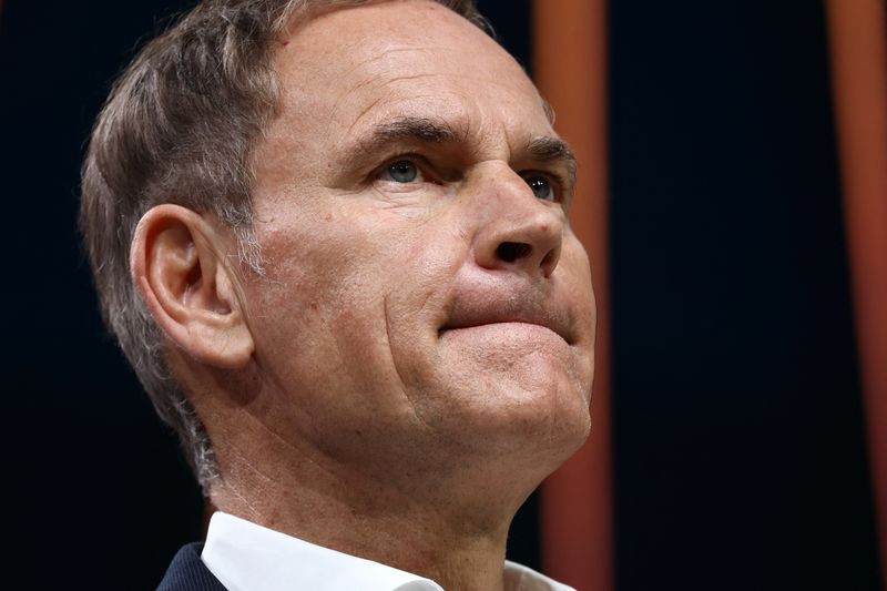FILE PHOTO: Oliver Blume, CEO of Volkswagen AG and Porsche AG, looks on during the annual Volkswagen Group press conference in Wolfsburg, Germany March 11, 2025. REUTERS/Liesa Johannssen/File photo