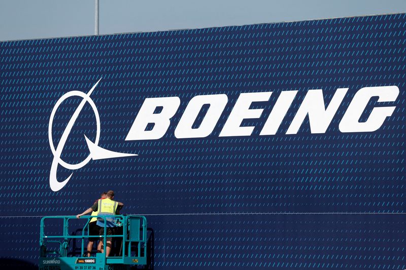 FILE PHOTO: A Boeing logo is seen before the opening of the 55th International Paris Airshow at Le Bourget Airport near Paris, France, June 13, 2025. REUTERS/Benoit Tessier/File Photo