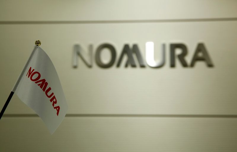 FILE PHOTO: The logo of Nomura Securities is pictured at the company's Otemachi Head Office in Tokyo, Japan, November 18, 2016. REUTERS/Toru Hanai/ File Photo