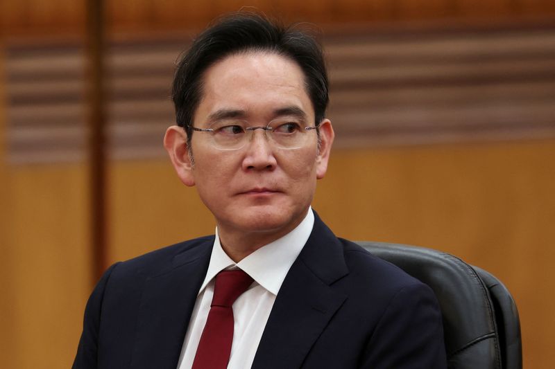 FILE PHOTO: Samsung Electronics Chairman Jay Y. Lee attends a meeting with Chinese President Xi Jinping (not pictured), at the Great Hall of the People in Beijing, China March 28, 2025. REUTERS/Florence Lo/ File Photo